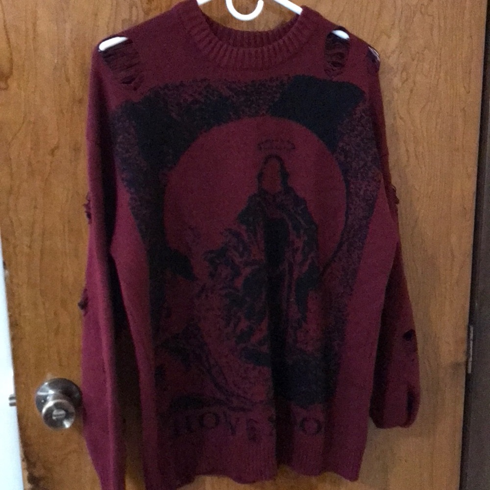 Red distressed sweater